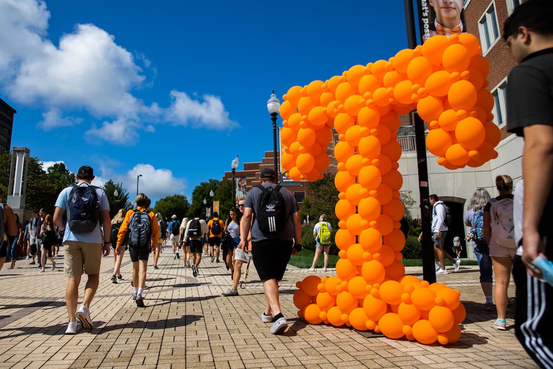 students walking on UT campus